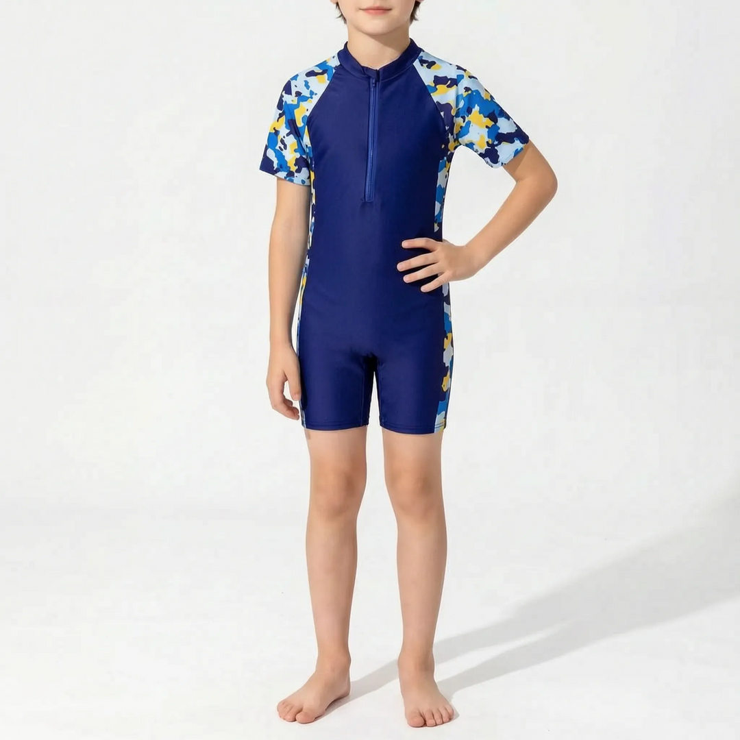 Robuster Kinder Rashguard kurzarm, einteilig, schützt die Haut beim Schwimmen & Spielen im Pool oder am Strand.