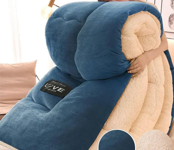 Gemütliche Wärmedecke, doppellagig & warm, als gesteppte Kuscheldecke für entspannte Winterabende.