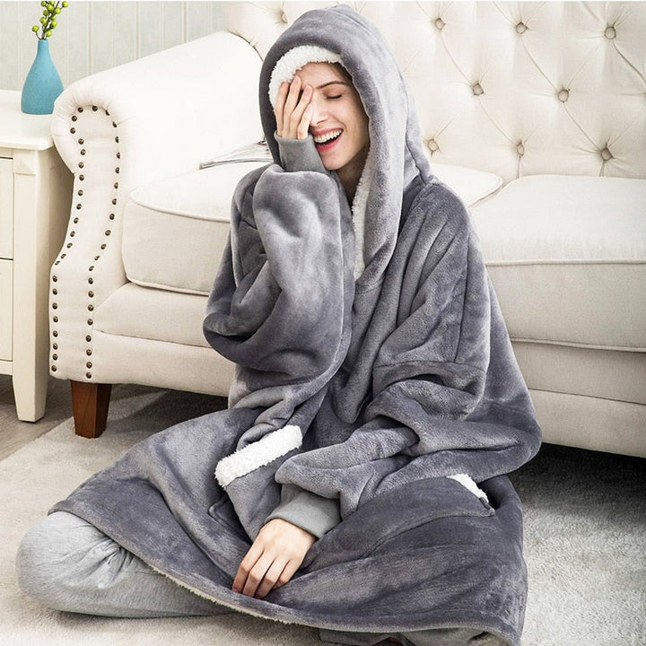 Unisex Kuschel Decken Hoodie aus ultraweichem Fleece, perfekt für gemütliche Stunden zuhause.