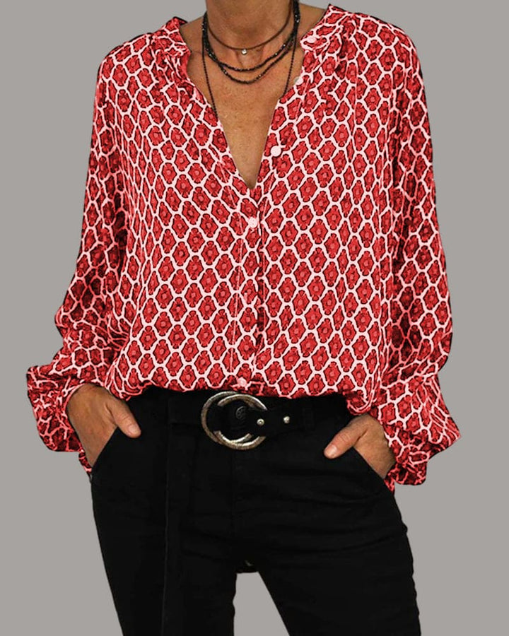 Sommerliche Damen Musterbluse mit V-Ausschnitt für einen chicen und komfortablen Look.