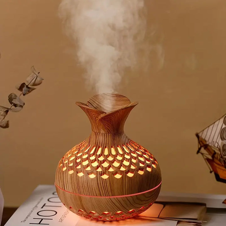 AromaBloom Duft-Diffuser mit sanftem LED-Licht. Ideal für beruhigendes Ambiente und Wellness im Schlafzimmer.