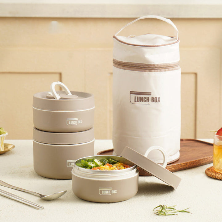Elegante Edelstahl-Lunchbox mit doppelwandiger Isolierung & handlicher Tragetasche für warme Gerichte.