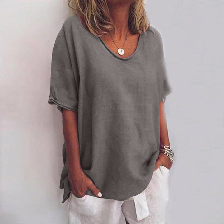 Vielseitiges Damen Kurzarm-T-Shirt, weite Bluse mit Rundhalsausschnitt, perfekt für entspannte Sommermode und Freizeitlooks.