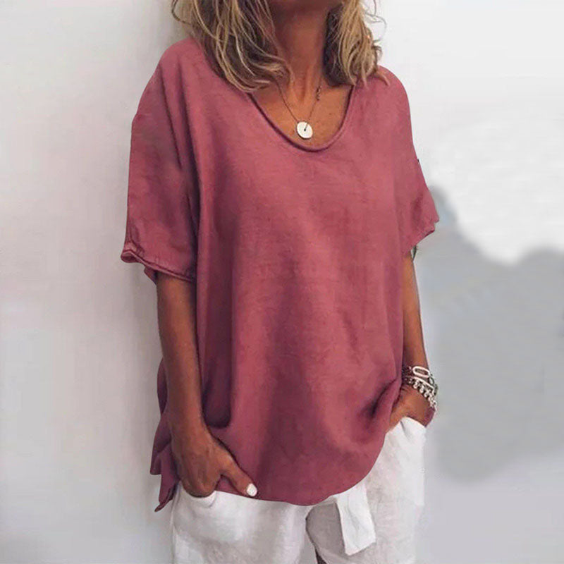 Komfortable Damen Bluse mit Rundhalsausschnitt, weiten Kurzarmen und lockerer Passform, perfekt für entspannte Sommermomente.