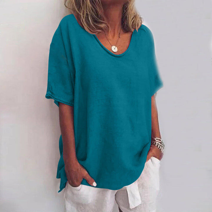 Modisches Damen T-Shirt mit Rundhalsausschnitt, weitem Schnitt und kurzen Ärmeln für einen lässigen, modernen Freizeitlook.