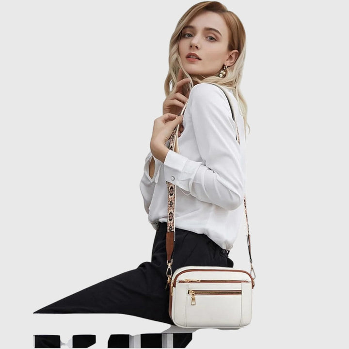 Modische Damen Schultertasche mit Blumenriemen, perfekt für den eleganten Auftritt. Praktisches und stilvolles Accessoire.