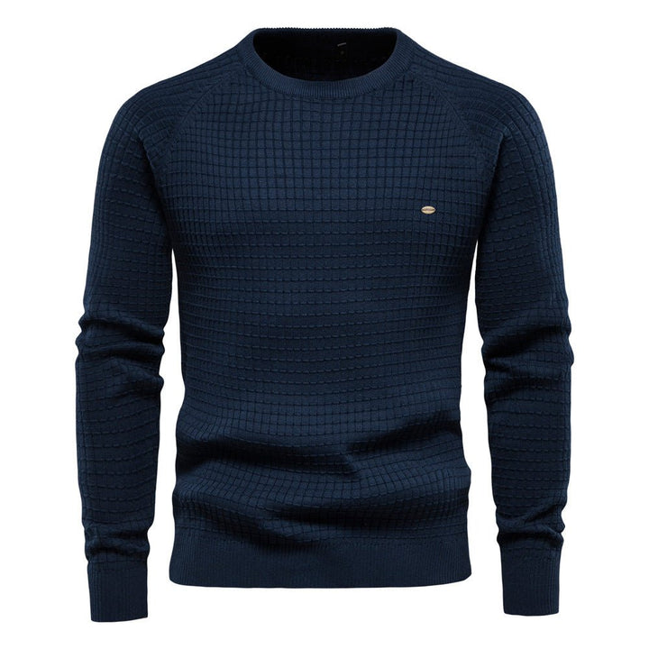 Herren Strukturpullover für den Winter in Marineblau. Warmer Strickpullover mit langen Ärmeln, ideal für kalte Tage.