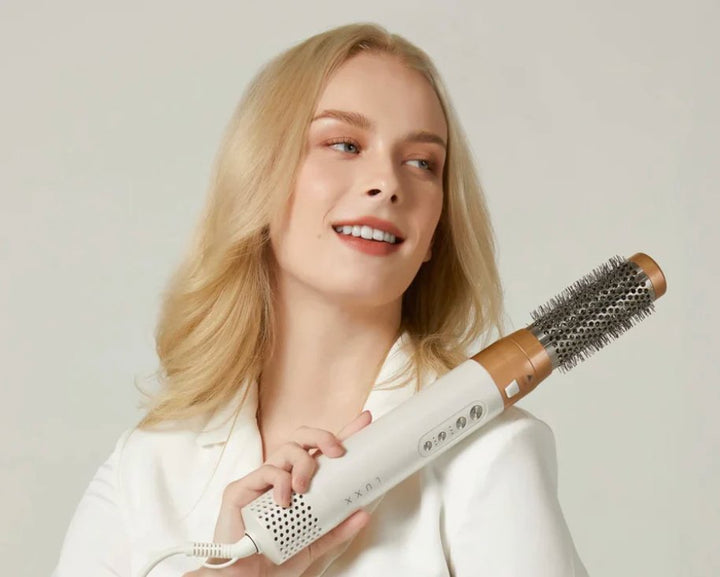 Premium 5-in-1 Stylinggerät: Haartrockner, Glätteisen, Lockenstab, Volumenbürste in einem.