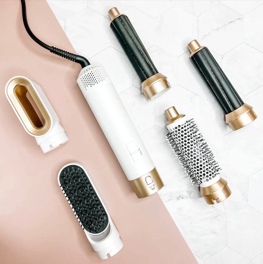 Der 5-in-1 Haarstyler: Ein Stylinggerät mit Lockenstab, Glätteisen und Volumenbürste.