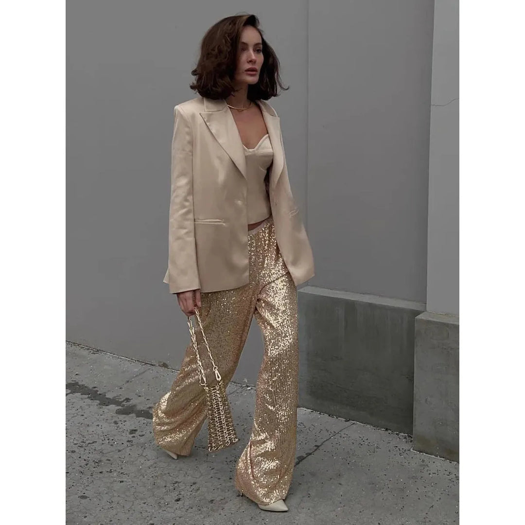 Stilvolle Paillettenhose Luna für Damen. Funkelnde Festtagshose in Silber-Gold für elegante Party-Looks.