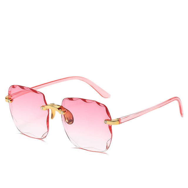 Sonnenbrille Clea: Randlos, eckig, vintage. Bietet stilvollen UV400-Schutz für Damen, Herren & alle Anlässe.