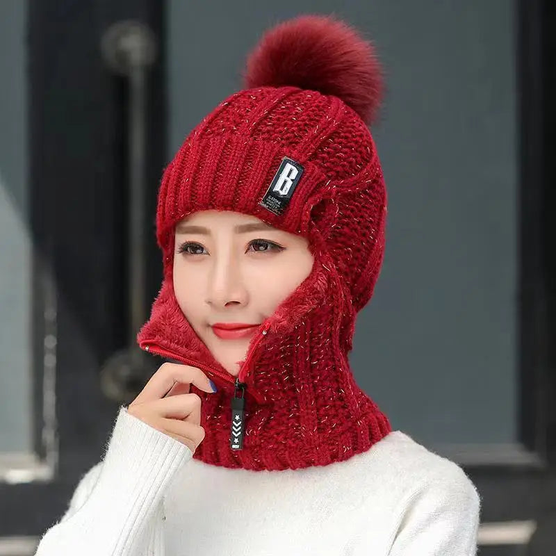 Damen Winter-Sturmhaube mit stylischem Bommel, warm & gemütlich. Trendiges Winteraccessoire für kalte Tage.