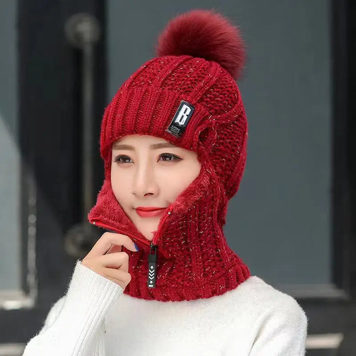 Damen Winter-Sturmhaube mit stylischem Bommel, warm & gemütlich. Trendiges Winteraccessoire für kalte Tage.