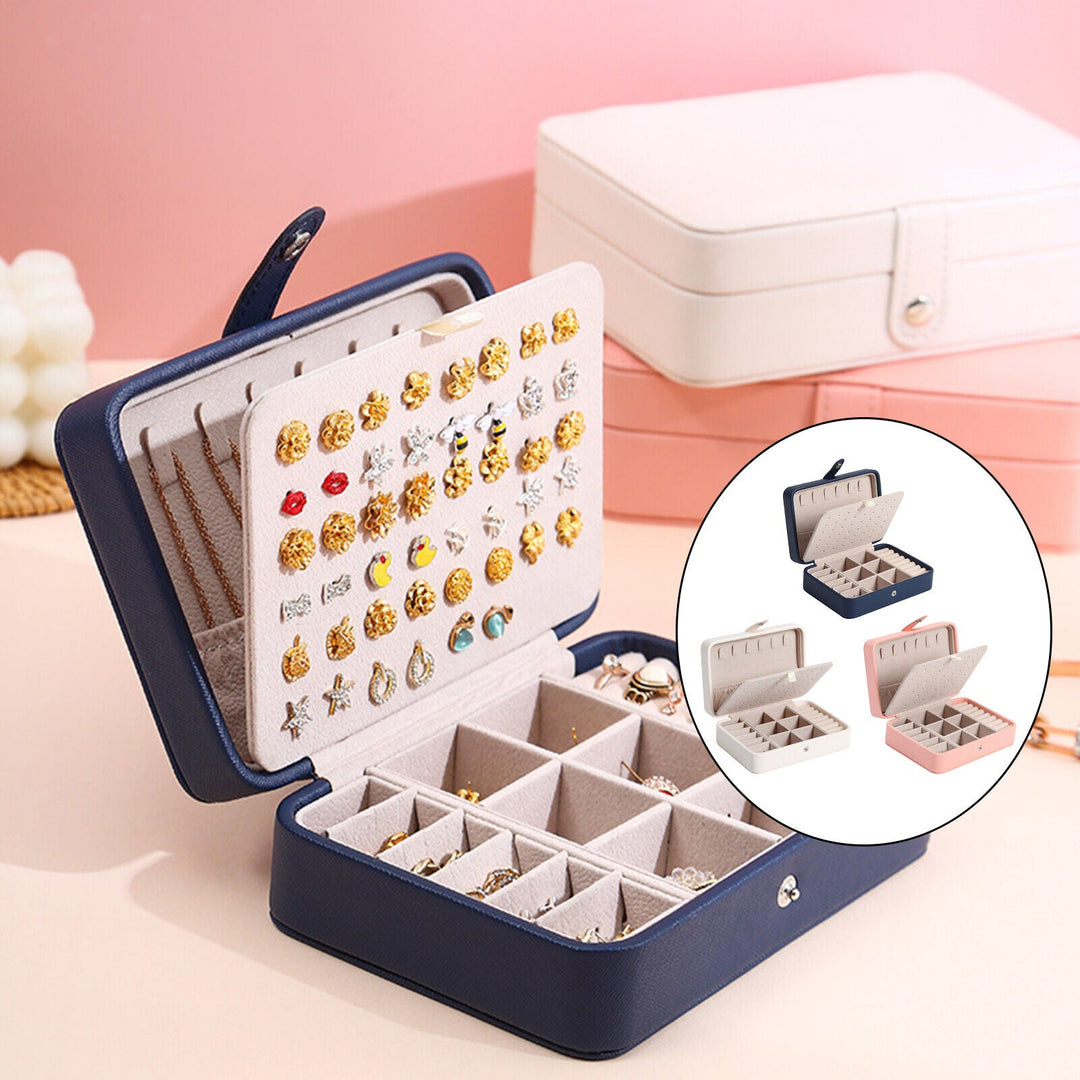 Präsentieren Sie Ihren Schmuck stilvoll: Eleganter Leder Schmuckkasten mit Klappdeckel für Ringe & Ohrringe.