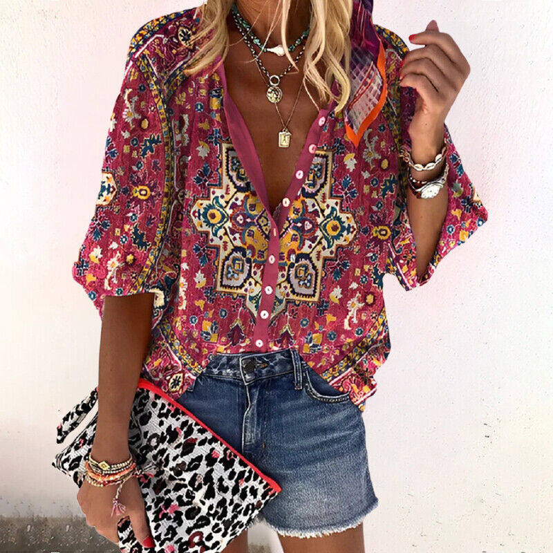Luftige Damen Sommerbluse mit elegantem Blumenprint und weiten Ärmeln. Ideal für warme Tage.