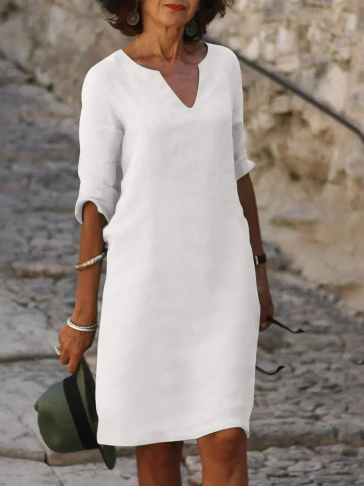 Modernes elegantes Damen Midi Kleid mit Kerbausschnitt, perfekt für stilvolle Auftritte im Sommer.