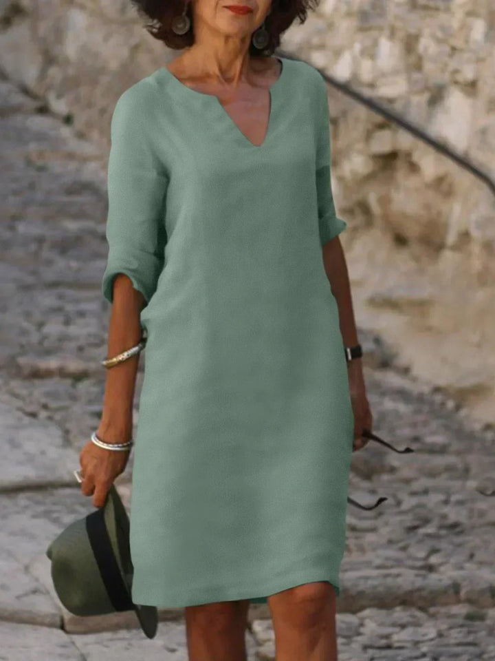 Damen Midi Kleid mit modischem Kerbausschnitt, ein stilvolles Must-have für sommerliche Partys & Events.