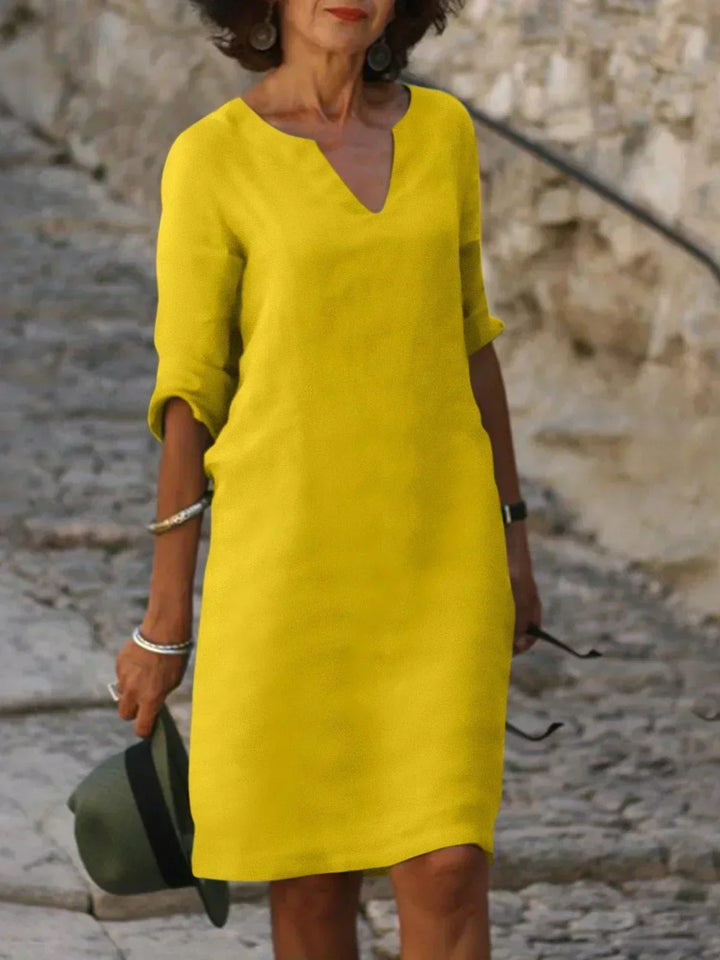 Vielseitiges Damen Midi Sommerkleid mit Kerbausschnitt, geeignet für Party, Freizeit und elegante Events.