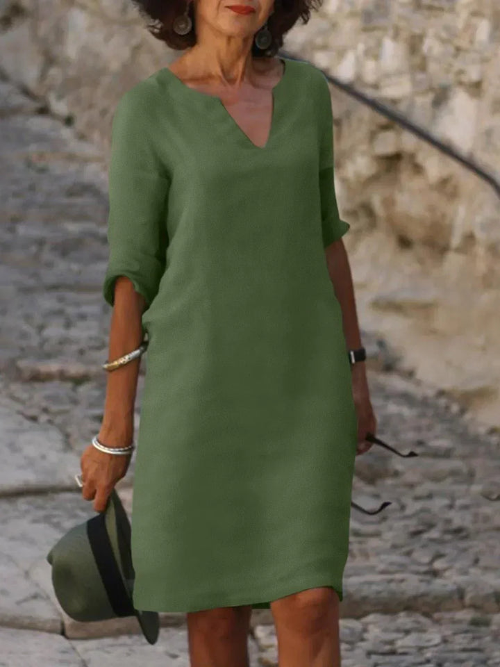 Zeitloses Damen Midi Kleid mit V-Ausschnitt, perfekt für Büro, Feierlichkeiten und Sommer.