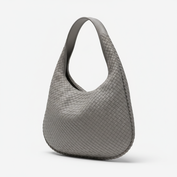 Strapazierfähige strukturierte Damenhandtasche aus Kunstleder, eine geräumige und praktische Alltagstasche.