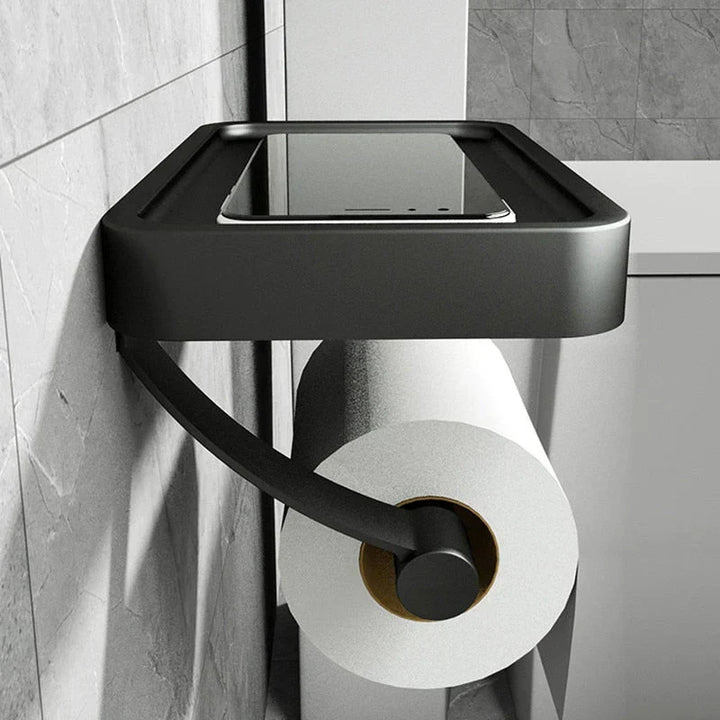 Wandmontierter WC-Rollenhalter aus Edelstahl mit integrierter praktischer Ablage. Einfache Installation.