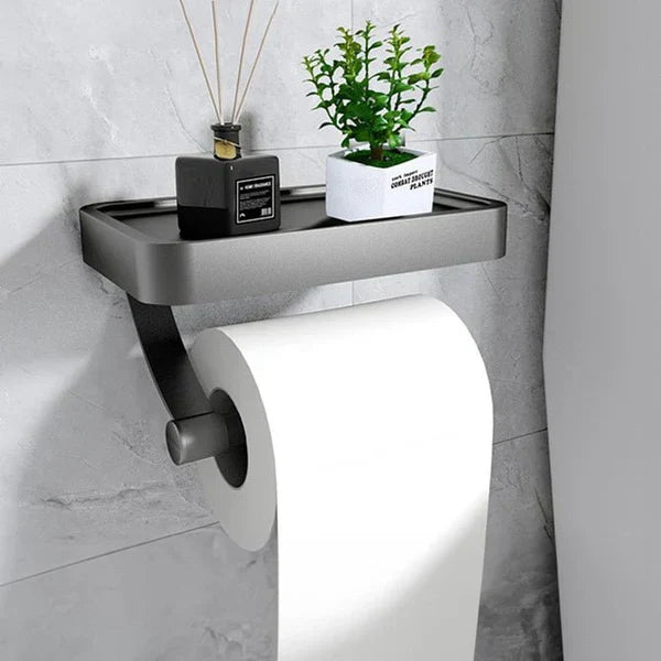 Funktionaler Toilettenpapierhalter mit Ablage für Badutensilien. Modernes Badaccessoire aus Edelstahl.