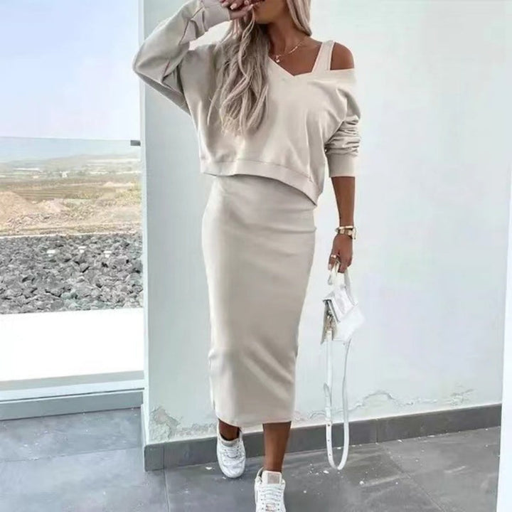Damen Zweiteiler Set: elegantes Midi Kleid und oversized Pullover. Ideales Freizeit Outfit für Frauen.
