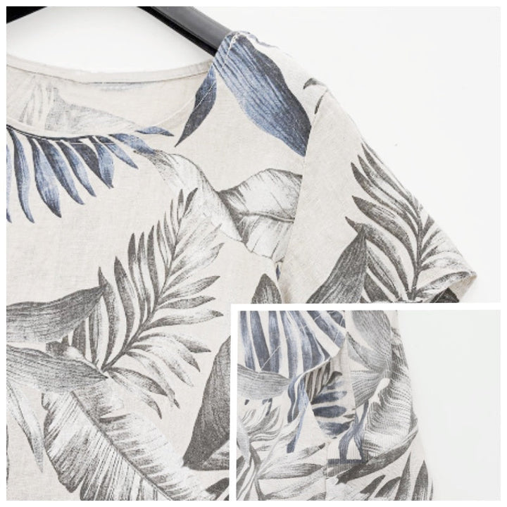 Elegantes Damen-Blumenkleid mit Rundhalsausschnitt, botanischem Print und praktischen Taschen, Sommermode.