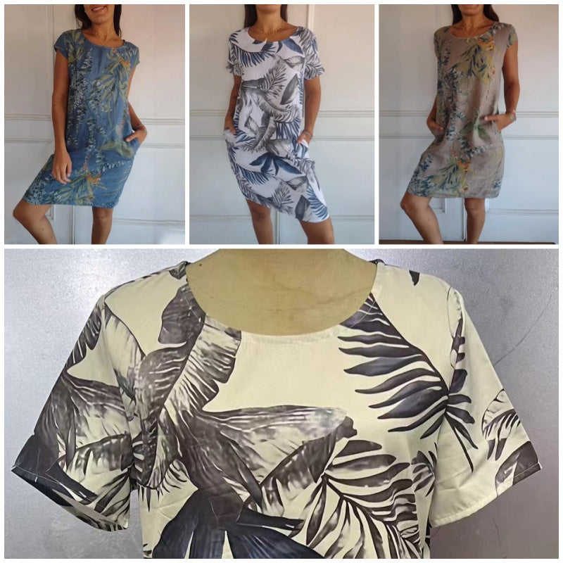 Luftiges Damenkleid mit floralem Design, Rundhals, bequemer Schnitt und nützliche Taschen für Frauen.