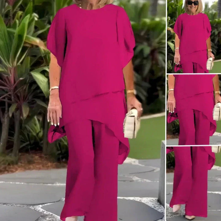Vielseitiges fuchsia Damen-Set: asymmetrisches Top & weite Hose. Komfortabler Zweiteiler für Business-Casual-Eleganz.