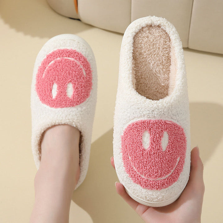 Trendige Unisex Hausschuhe mit Smiley-Gesicht, weich und warm, eine fröhliche Geschenkidee für alle.