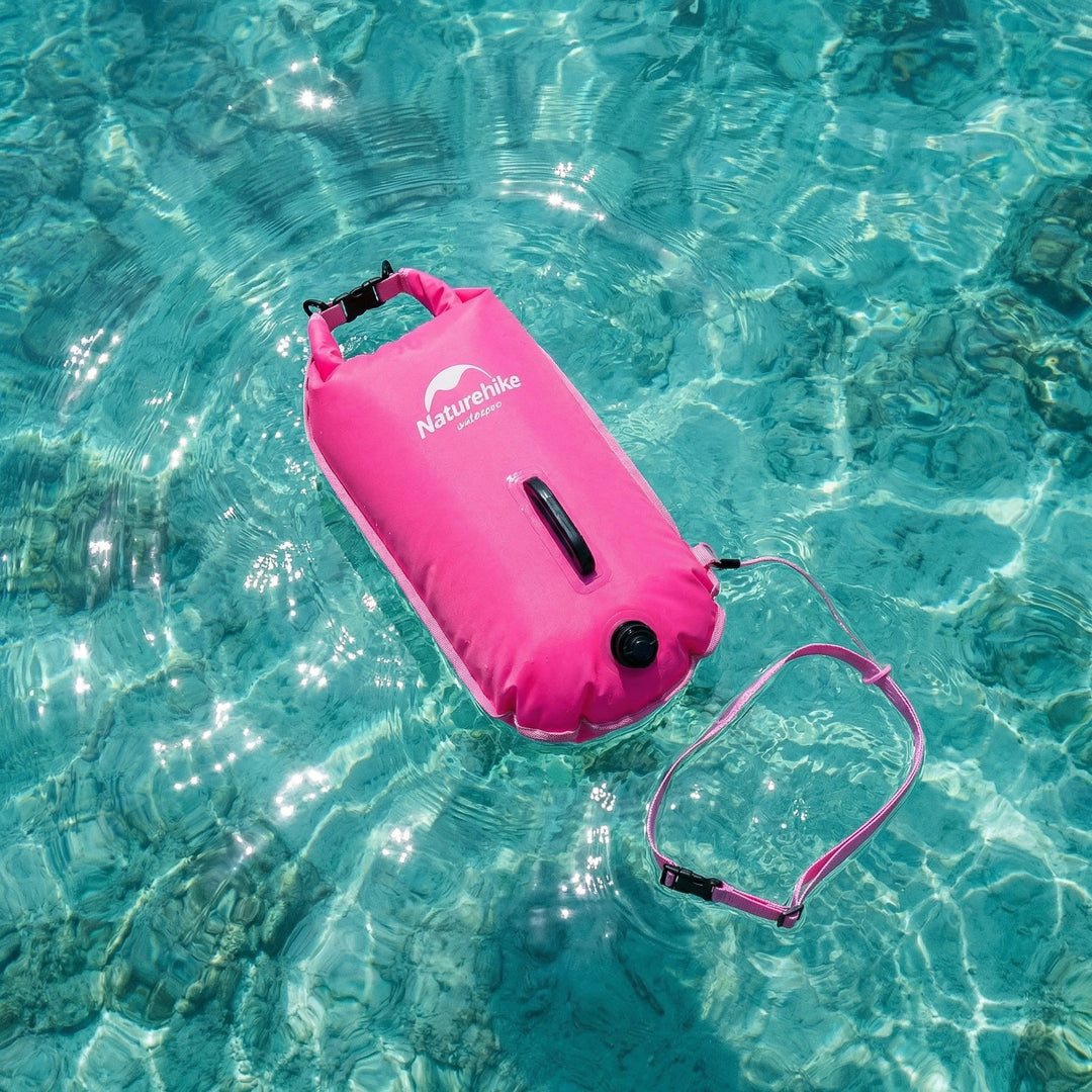 Fluororange Schwimmhilfe mit integriertem wasserdichtem Fach für Schwimmsport & Outdoor-Training.