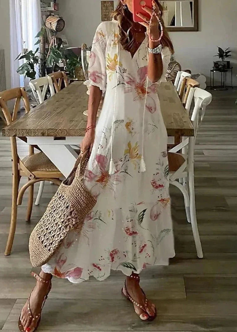 Bequemes, elegantes Damen Maxikleid mit Blumenmuster & Kordelzug, ideal für entspannte Sommertage.