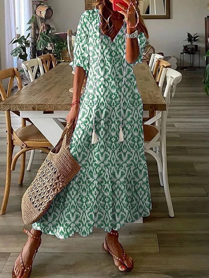 Langes Damen Maxikleid im Boho-Stil, ein luftiges Sommerkleid mit kurzen Ärmeln für Freizeit & Strand.